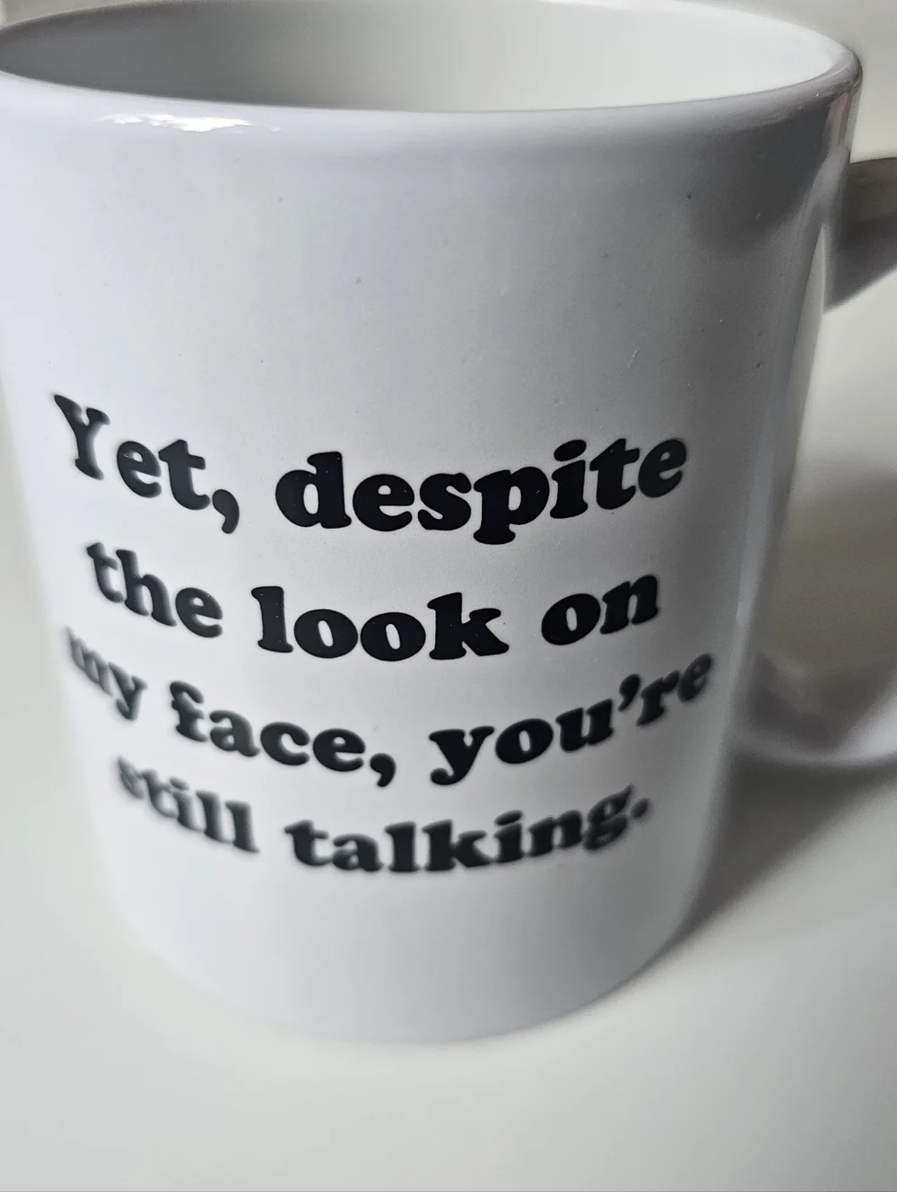 Yet, Despite The Look On My Face, You're Still Talking Cup Mug